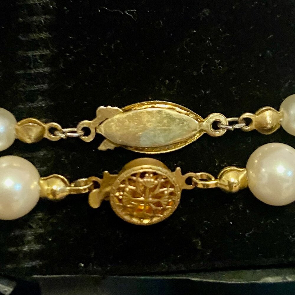 Costume jewelry lot of 4 faux pearl necklaces.  One marked Japan